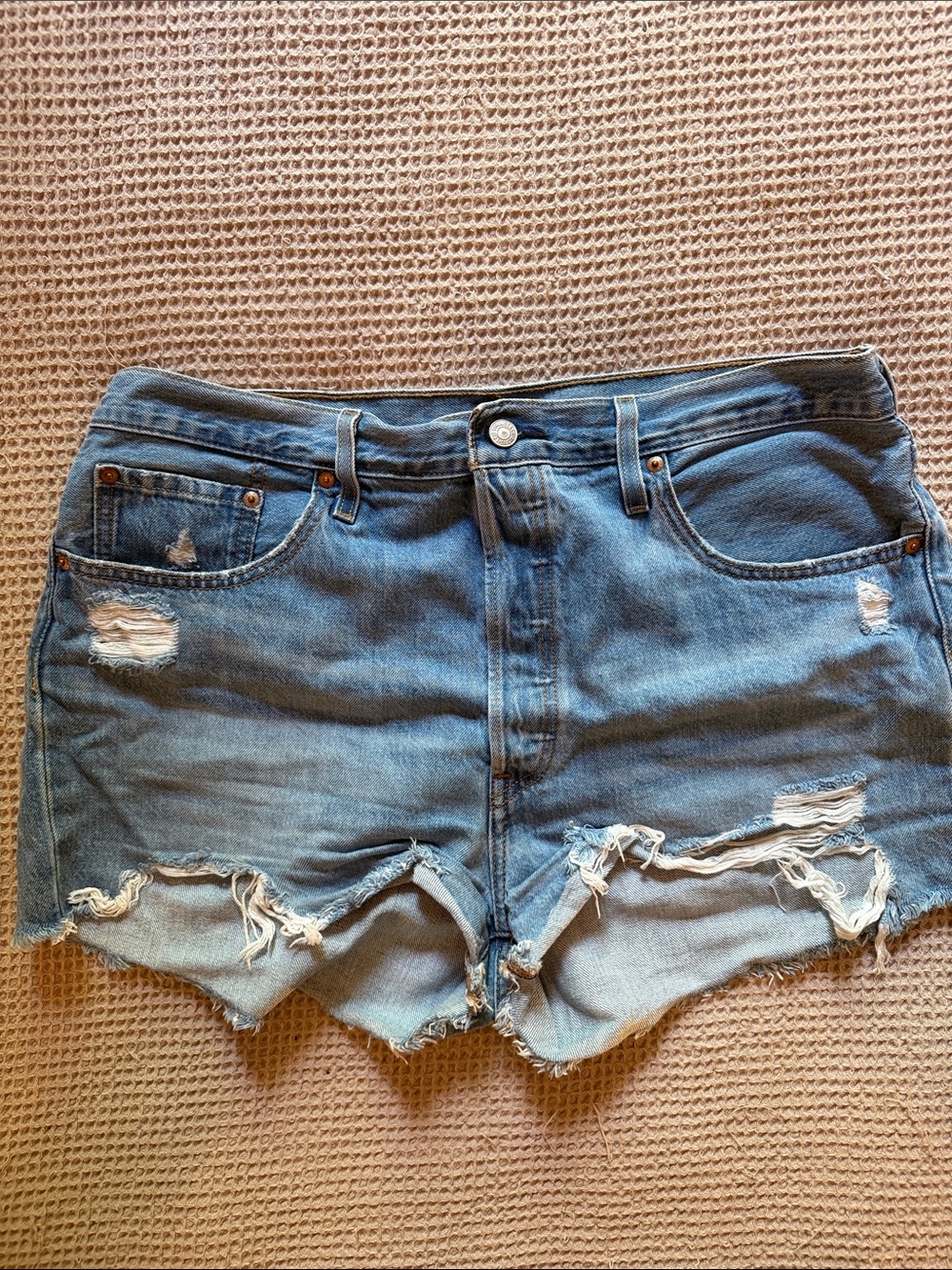 Levi's Distressed Light Blue Denim Cutoff Shorts